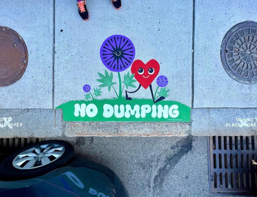 Sidewalk mural with bright green grass and cartoon flowers, including a smiling red heart and a purple blossom. The message “No Dumping” is written in large bubble letters. Sponsored by Major Bloom.