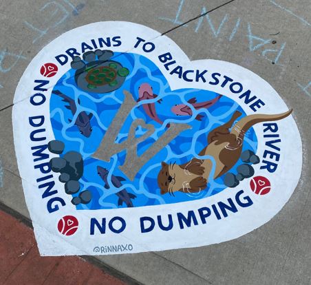 Heart-shaped mural showing underwater river animals like fish, turtles, and otters with a large “W” in the center. Text around the mural reads “Drains to Blackstone River – No Dumping.” Sponsored by the Worcester Red Sox.